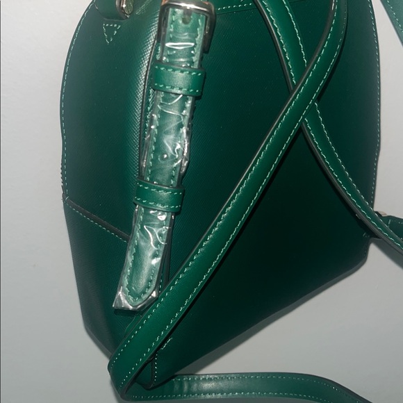 Kate Spade Schuyler mini backpack in the color Deep Jade green. - Picture 4 of 13